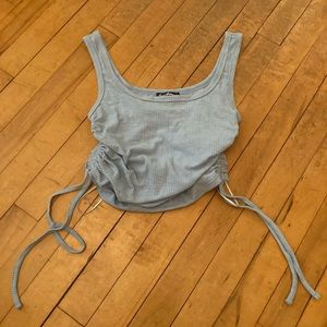 Blue tank top with drawstrings on each side